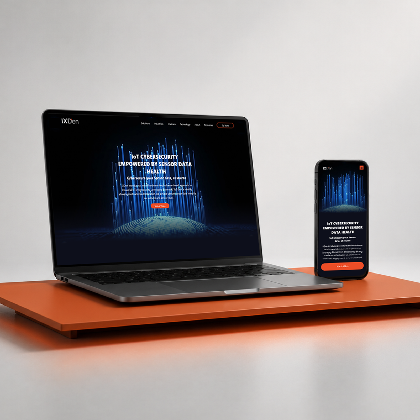 IXDen website shown on laptop and mobile